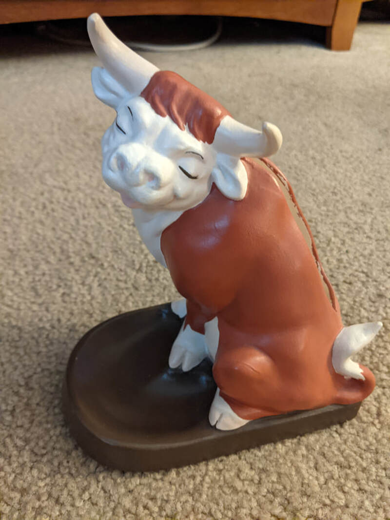 Steer brush holder